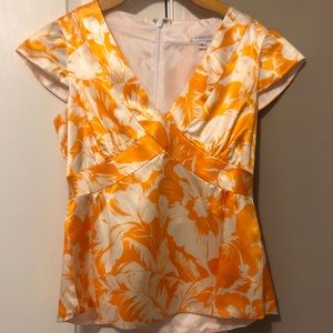 Vanessa Fox Orange and White floral zip up top.